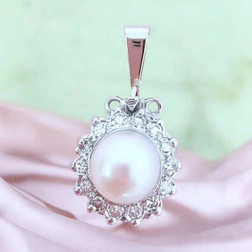 Pendentif Pendentif perle de culture et diamants en or blanc 18 carats 58 Facettes AA 1677