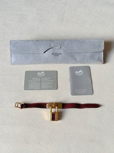 Montre Hermès Kelly - Montre à quartz en plaqué or et cuir bordeaux 58 Facettes WC-2025-1886