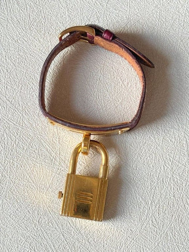 Montre Hermès Kelly - Montre à quartz en plaqué or et cuir bordeaux 58 Facettes WC-2025-1886
