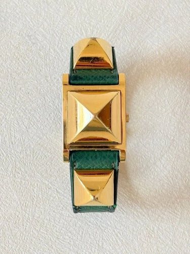 Montre Hermès Médor - Montre en plaqué or, cuir vert 58 Facettes WC-2025-1884