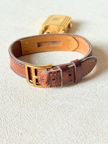 Montre Hermès Kelly - Montre à quartz avec bracelet cuir marron 58 Facettes WC-2025-1813