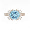 Bague Bague design en or blanc 18 carats avec topaze bleue et diamants 58 Facettes AO-0003