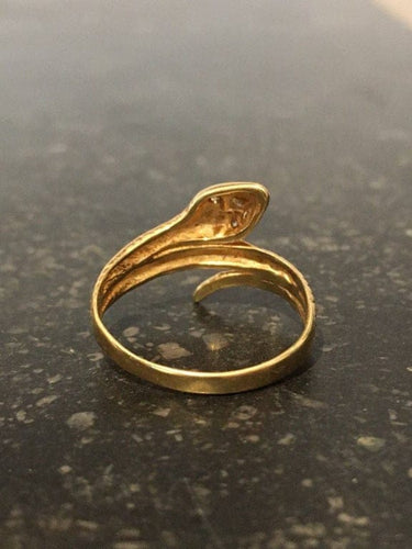 Bague 56 Bague serpent en or jaune 18k et 3 diamants 58 Facettes