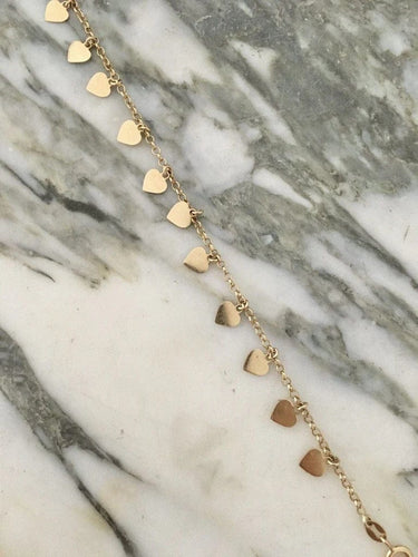 Bracelet Bracelet cœurs en or jaune 18 carats 58 Facettes