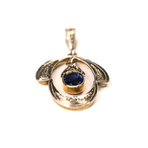 Pendentif Pendentif Belle Époque à pampille en or deux tons et verre bleu 58 Facettes LMB-336