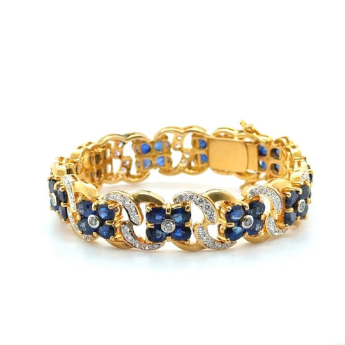 Bracelet Bracelet en or jaune 22 carats serti de saphirs et diamants 58 Facettes 1.0002546/1