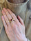 https://cdn.shopify.com/s/files/1/0647/1470/3075/files/Bague_Vintage_-_Bague_Jonc_Rubis_Cabochon_Or_Jaune_-_Joaillerie_Paris_-_Les_Pierres_de_Julie_3.jpg?v=1771862617