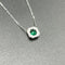 Collier Collier pendentif émeraude de Colombie entourée de diamants en or blanc 58 Facettes