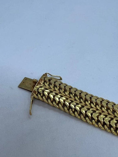 Gourmette maille passementerie en or jaune 750 58 Facettes 018548063278