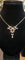Collier Collier Art nouveau - Pendentif en or jaune 18 ct et 15 ct, rubis et perles 58 Facettes