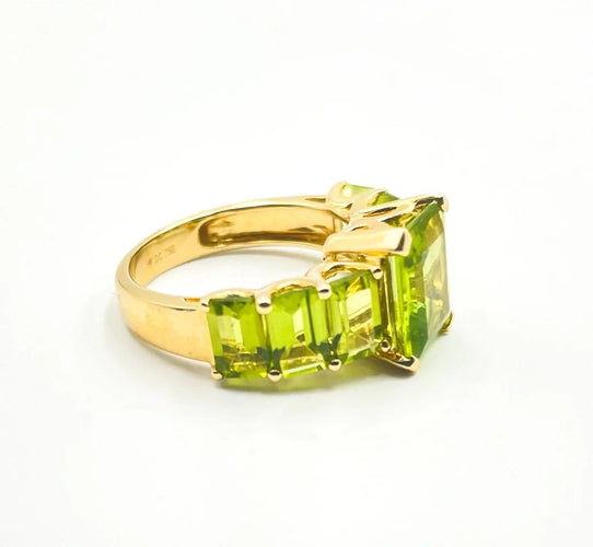 Bague 54 Bague péridots taille émeraude en or jaune 58 Facettes