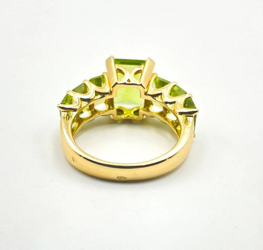 Bague 54 Bague péridots taille émeraude en or jaune 58 Facettes