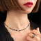 Collier Georges Lenfant - Chaîne giletière Art déco en platine, onyx et perles fines 58 Facettes A3167