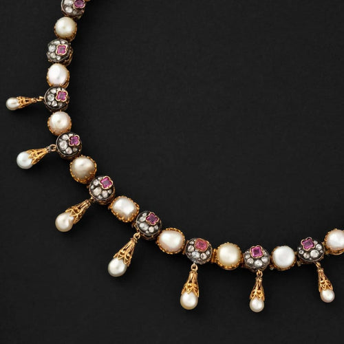 Collier Collier rivière à pampilles en or et argent, diamants, rubis et perles fines 58 Facettes A3148