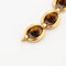 Bracelet Boucheron - Bracelet vintage en or 750 et œil de tigre 58 Facettes