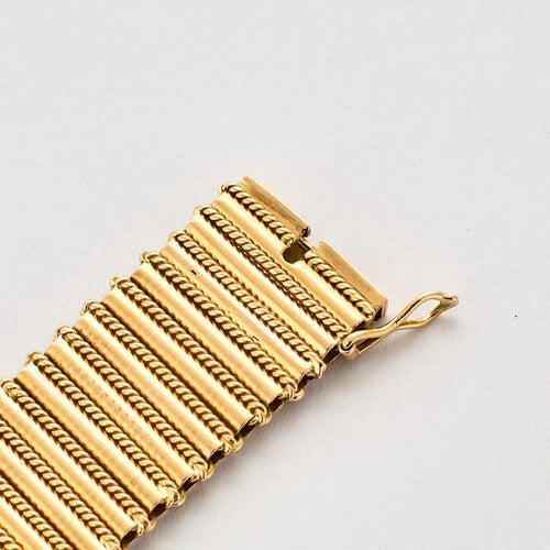 Bracelet Bracelet articulé en or jaune 18K (750) 58 Facettes LF23
