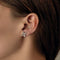 Boucles d'oreilles Boucles d’oreilles en or blanc en forme de trèfle et diamants 58 Facettes F59