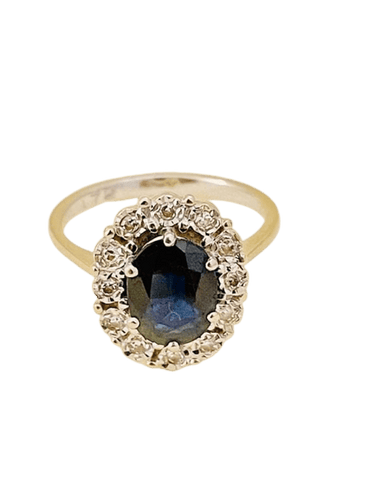 Bague 53 Bague marguerite en or gris 18K et saphir ovale 58 Facettes