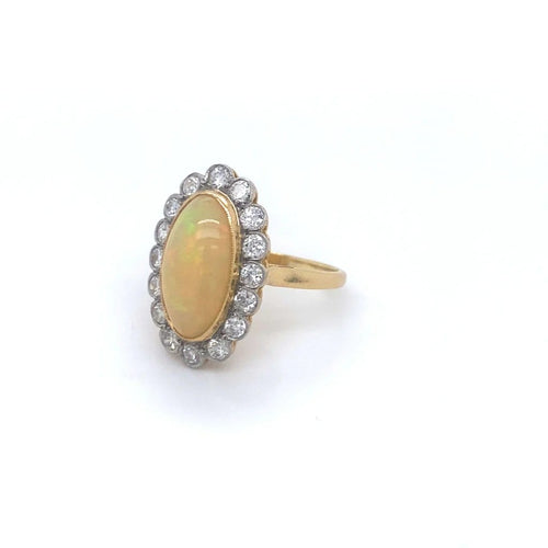 Bague 55 Bague en or jaune 18 K - Opale et halo de diamants 58 Facettes