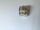 Bague 54 Pomellato Tubolare - Bague godronnée en or jaune et or blanc diamants 58 Facettes