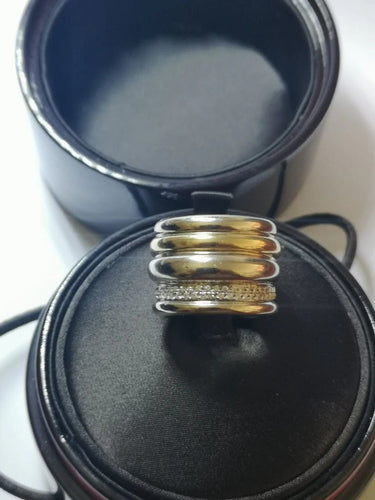 Bague 54 Pomellato Tubolare - Bague godronnée en or jaune et or blanc diamants 58 Facettes