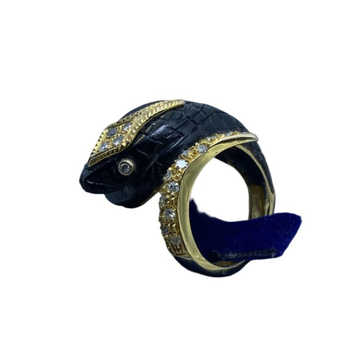 Bague 57 Bague en or jaune 14 kt, diamants et onyx 58 Facettes