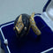 Bague 57 Bague en or jaune 14 kt, diamants et onyx 58 Facettes