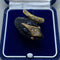 Bague 57 Bague en or jaune 14 kt, diamants et onyx 58 Facettes