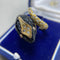 Bague 57 Bague en or jaune 14 kt, diamants et onyx 58 Facettes