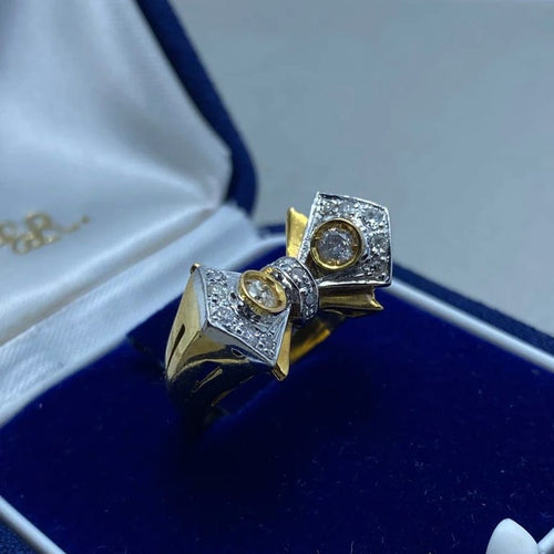 Bague 50 Bague en or jaune 14 kt avec diamant taille brillant 58 Facettes