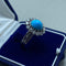 Bague 57 Bague en or blanc 18 kt avec turquoise et diamants 58 Facettes