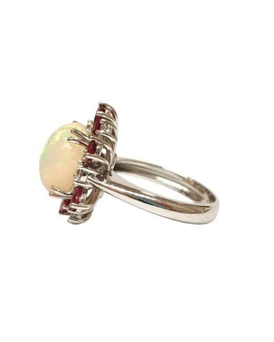 Bague 55 Bague en or blanc 18 carats avec opale, rubis et diamants 58 Facettes