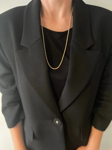 Collier Collier maille torsadée en or jaune 18 carats 58 Facettes 39
