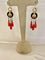 Boucles d'oreilles Boucles d’oreilles pendantes en or jaune 18 carats, onyx, corail et perles fines 58 Facettes 862568