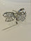 Boucles d'oreilles Broche double clip en or gris 18 carats et diamants 58 Facettes 1064033