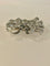 Boucles d'oreilles Broche double clip en or gris 18 carats et diamants 58 Facettes 1064033