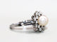 Bague 59 Bague marguerite en or blanc 18K avec perle et diamants 58 Facettes