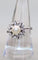 Bague 59 Bague marguerite en or blanc 18K avec perle et diamants 58 Facettes