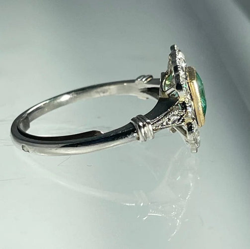 Bague 51 Bague début XXe en or gris 18 carats, émeraude et diamants 58 Facettes 205