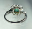 Bague 51 Bague début XXe en or gris 18 carats, émeraude et diamants 58 Facettes 205