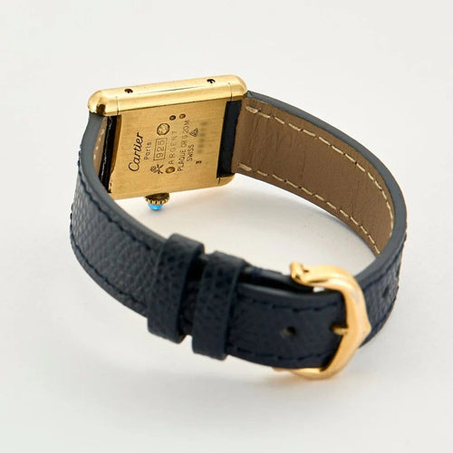 Montre Cartier Tank Must - Montre en argent 925 plaqué or, cadran noir laqué 58 Facettes
