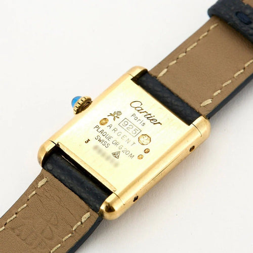 Montre Cartier Tank Must - Montre en argent 925 plaqué or, cadran noir laqué 58 Facettes