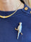 Broche Hermès - Broche perroquet en argent 925 et or jaune 18K 58 Facettes