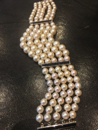 Bracelet Bracelet Art déco à cinq rangs de perles en or gris et saphirs 58 Facettes