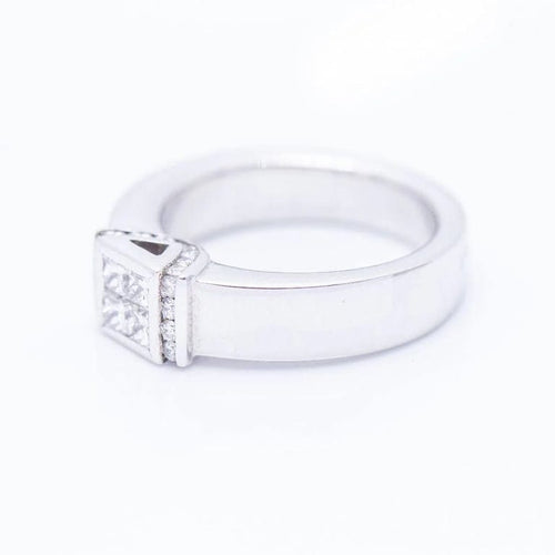 Bague 53 Bague en or blanc 18 ct avec diamants taille princesse et brillants 58 Facettes N102929EJ