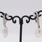 Boucles d'oreilles Boucles d'oreilles - Perles baroques naturelles et diamants en or blanc 18 ct 58 Facettes D359537JC