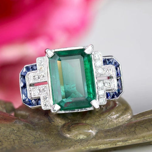 Bague 53 Bague Art déco en or blanc avec émeraude, diamants et saphirs 58 Facettes 25-137