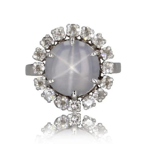 Bague 52 Bague marguerite en or blanc et platine, saphir étoilé et diamants 58 Facettes 24-150