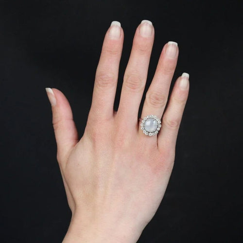 Bague 52 Bague marguerite en or blanc et platine, saphir étoilé et diamants 58 Facettes 24-150