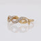 Bague 53 Bague moderne entrelacée en or jaune et blanc avec diamants 58 Facettes 16-344D